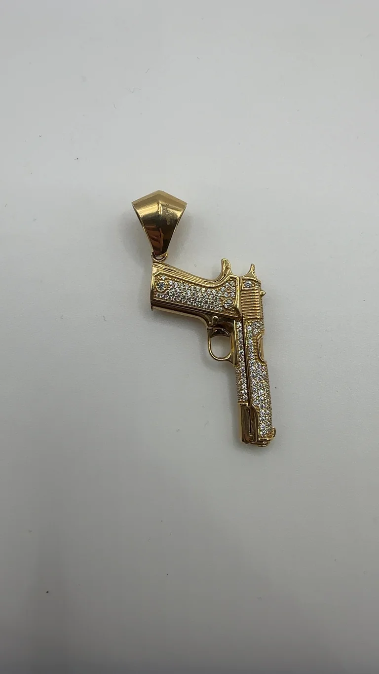 14 kt Goldanhänger Revolver